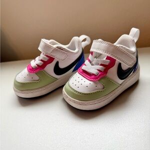 Nike Kids White, Pink, Green, and Blue Sneakers